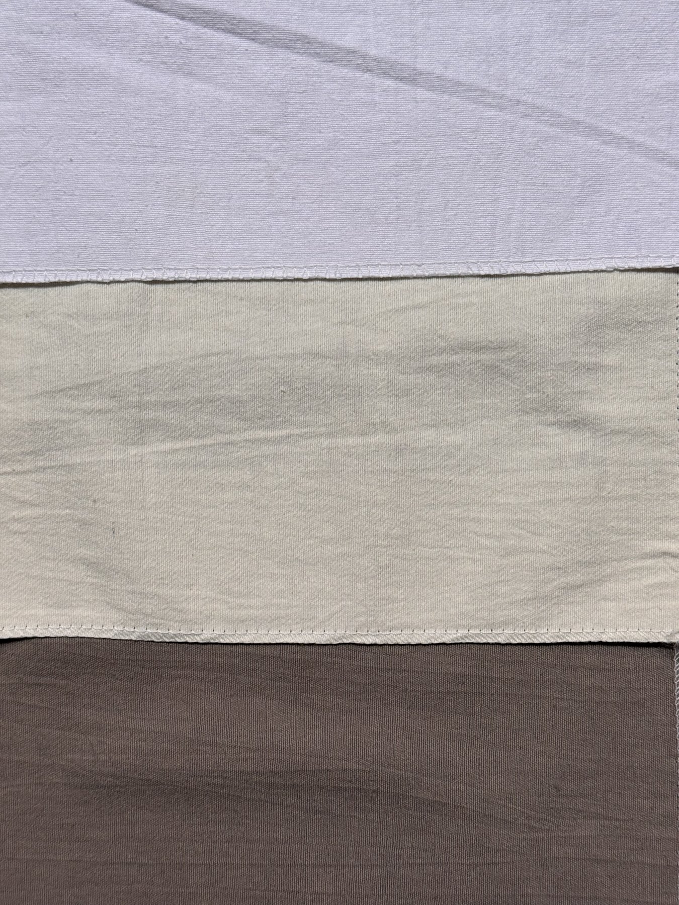 Muestrario Línea Tussor de telas traslúcidas para riel europeo en blanco, natural y gris